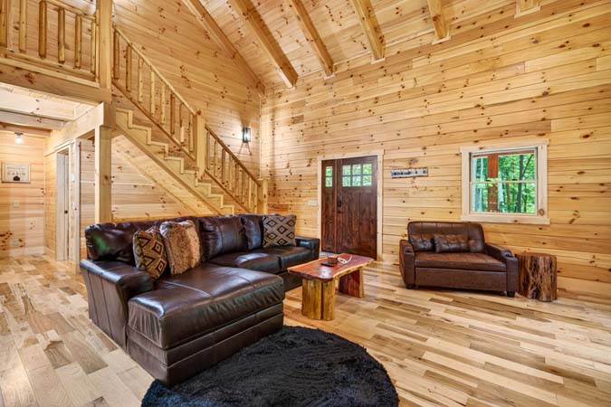 Cabin deck overlooking peaceful wooded scenery
