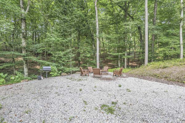 Shagbark Hickory Ridge, Hocking Hills — gravel drive curving down through the woods