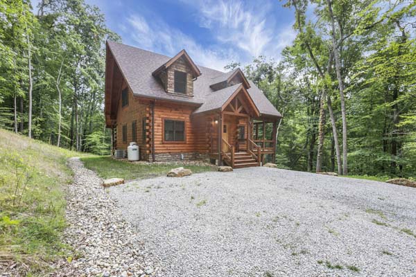 Shagbark Hickory Ridge, Hocking Hills — covered front entry with cedar steps and craftsman door