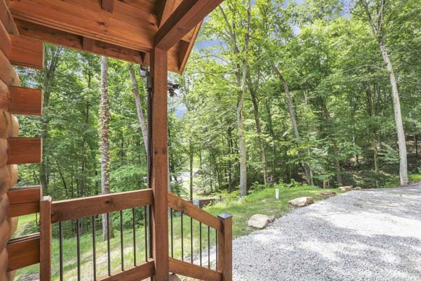 Shagbark Hickory Ridge, Hocking Hills — porch gate looking out over the driveway and woods